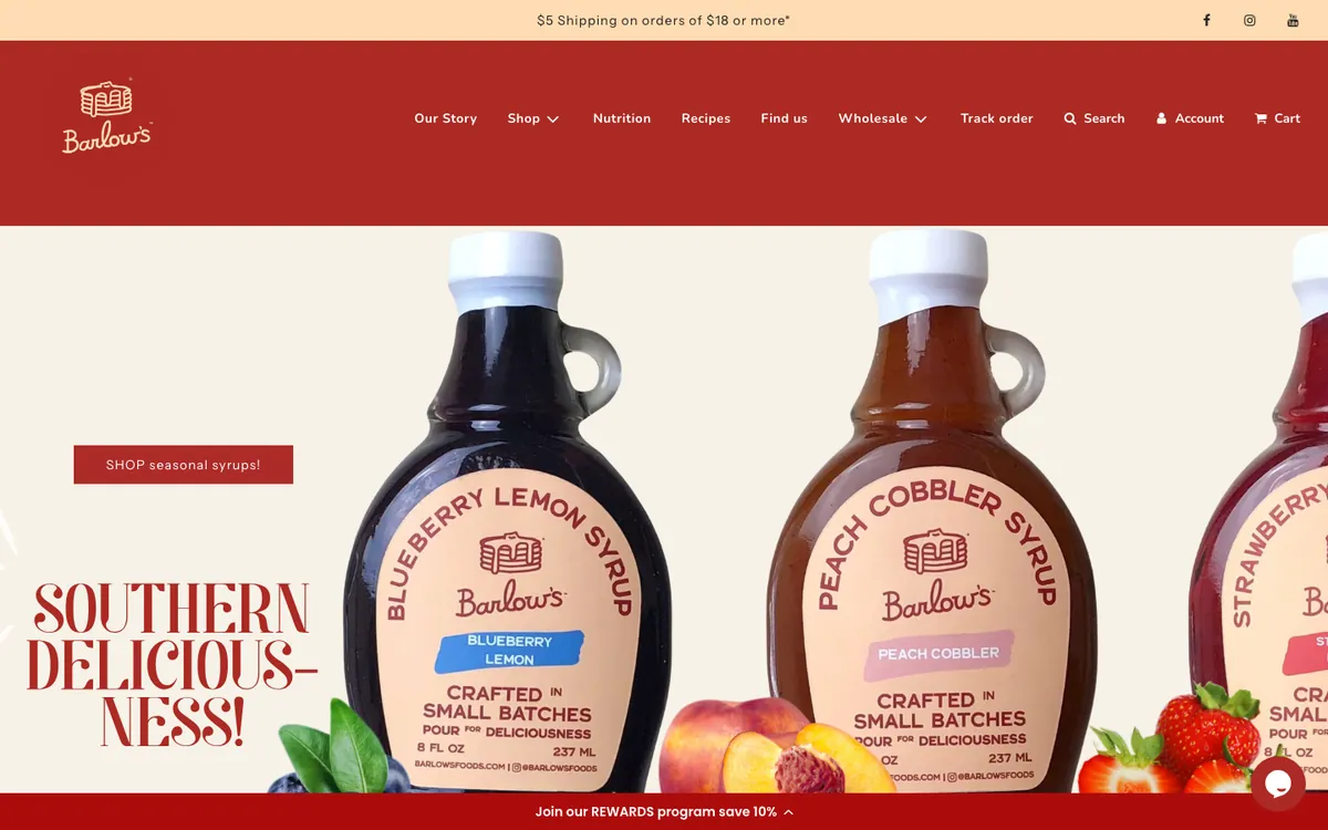 barlowsfoods.com — bottle slideshow, “SHOP seasonal syrups!”, a shipping bar on top and a rewards bar pinned to the bottom