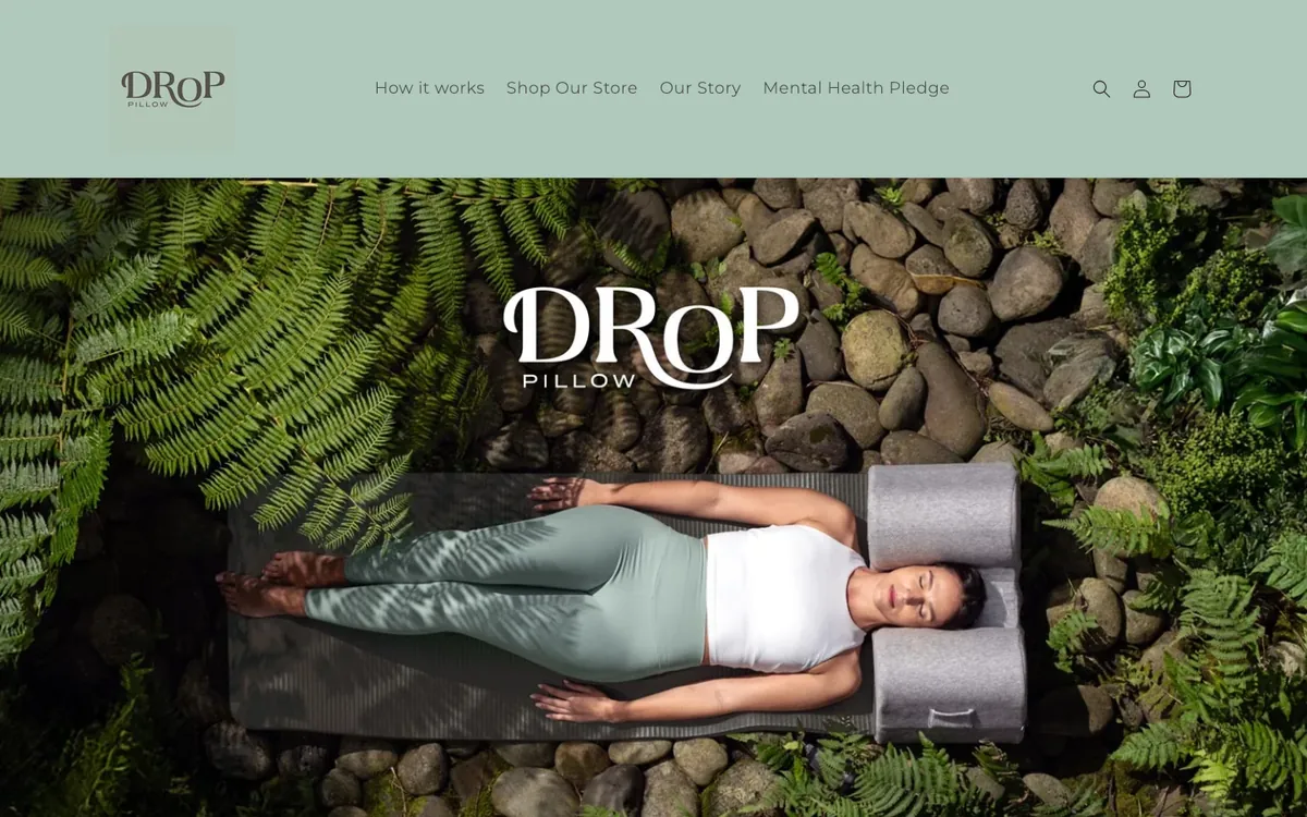 droppillow.com — the first screen on desktop: the logo over the hero film, and a nav whose links jump down this same page